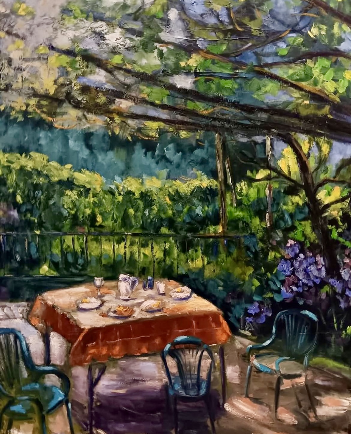 Garden table with orange cloth set under a pergola, oil on canvas by Sonya Tanios